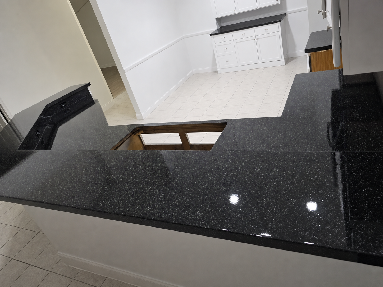 Close view of a glossy black refinished countertop